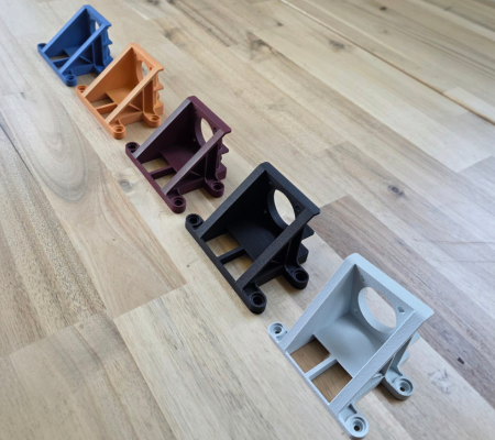 Different coloured dyed SLS parts in a row